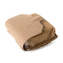 Tan fabric pouch on its side on a white background